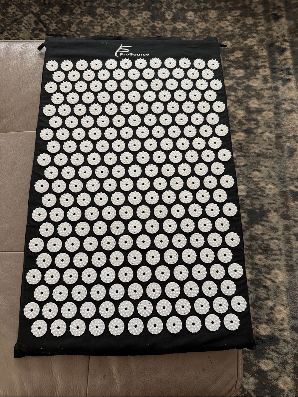 Black Acupressure Mat with White Massage Nodes